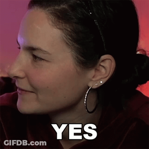 Close Up Of Woman Face With Yes Above GIF