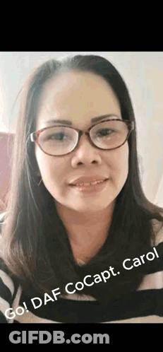 Close Up Of Woman In Glasses And Striped Shirt GIF