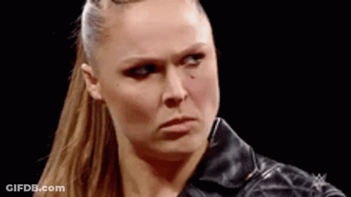 Close Up Of Woman In Leather Jacket And Ponytail GIF