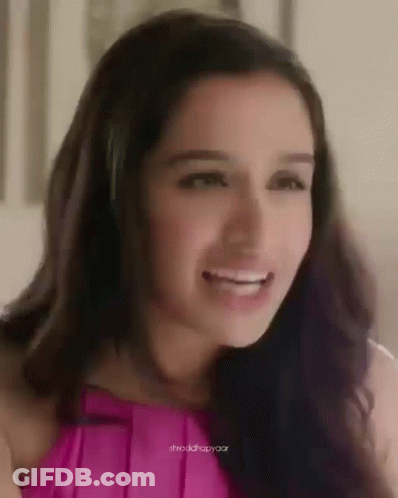 Close-Up Of Woman In Pink Top GIF