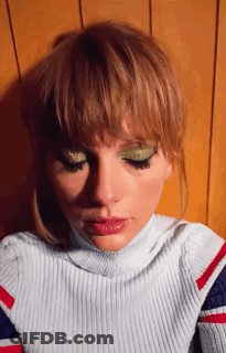 Close Up Of Woman In Striped Shirt GIF