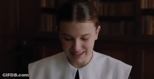 Close Up Of Woman In White Shirt And Collar GIF