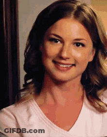 Close-Up Of Woman In White Shirt Smiling GIF
