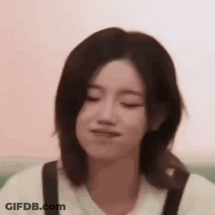 Close Up Of Woman Making Face With Eyes Closed GIF