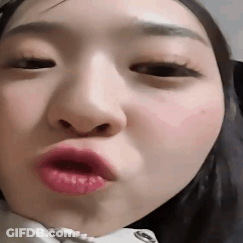 Close Up Of Woman Making Funny Face With Mouth Open GIF