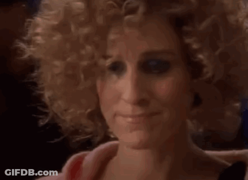 Close Up Of Woman's Curly Blonde Hair GIF