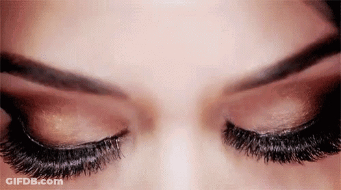 Close Up Of Woman's Eyes With Eyelashes And Eyeshadow GIF