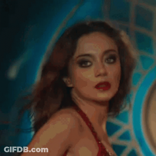 Close Up Of Woman's Face In Blurry Photo GIF