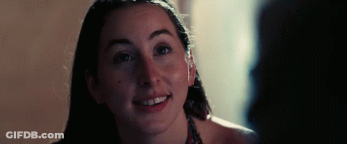 Close Up Of Woman's Face In Dark Room GIF