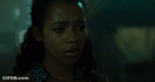Close Up Of Woman's Face In Darkness GIF