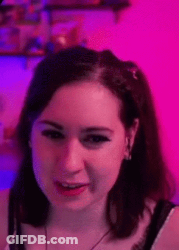 Close Up Of Woman's Face On Pink Background GIF