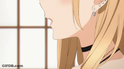 Close Up Of Woman's Face With Earrings GIF