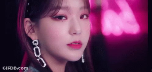 Close Up Of Woman's Face With Earrings GIF
