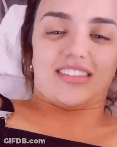 Close Up Of Woman's Face With Eyes Closed Smiling GIF