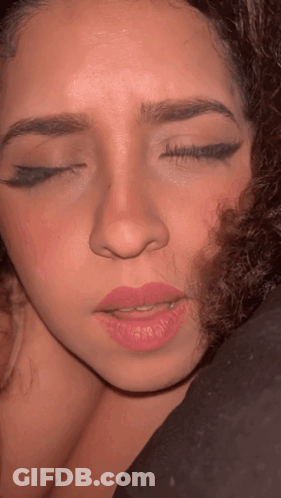 Close Up Of Woman's Face With Half Closed Eyes GIF