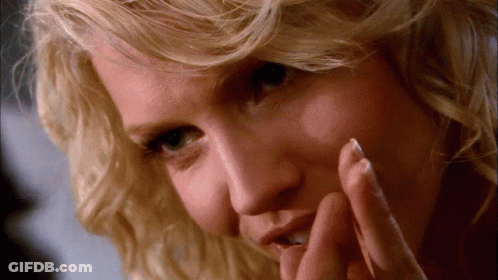 Close Up Of Woman's Face With Hand On Chin GIF