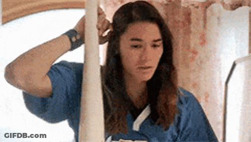 Close Up Of Woman's Face With J Letter GIF