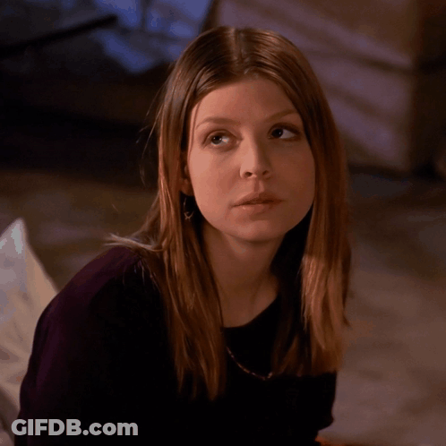 Close Up Of Woman's Face With Long Brown Hair GIF