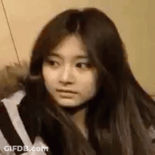 Close Up Of Woman's Face With Long Hair And Striped Shirt GIF