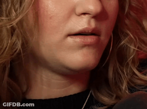 Close Up Of Woman's Mouth With Black Shirt GIF