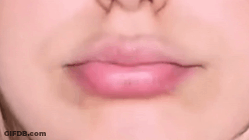 Close Up Of Woman's Mouth With Pink Lipstick GIF