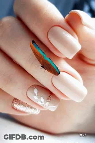 Close-Up Of Woman's Nails With Butterfly Flying GIF