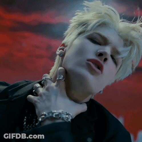 Close Up Of Woman's Neck With Red Background GIF