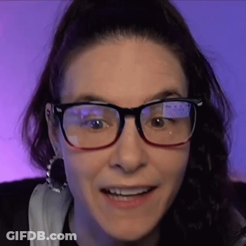 Close Up Of Woman Wearing Glasses And Smiling GIF