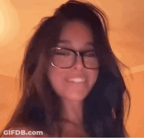 Close Up Of Woman Wearing Glasses GIF