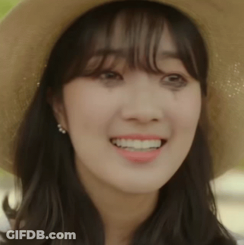 Close Up Of Woman Wearing Hat GIF