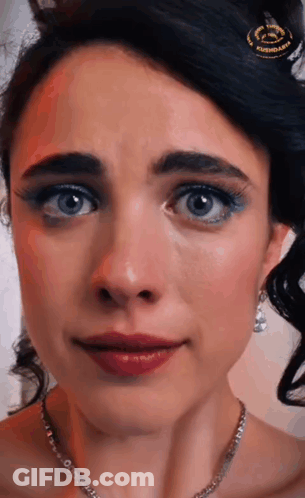 Close Up Of Woman Wearing Necklace GIF