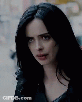 Close Up Of Woman With Black Hair And Serious Look GIF