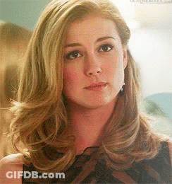 Close Up Of Woman With Blonde Hair And Earrings GIF