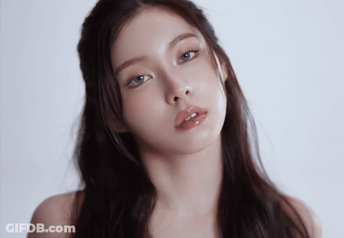 Close Up Of Woman With Blue Eyes GIF