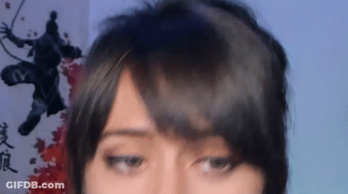 Close Up Of Woman With Drawing Of Man In Background GIF