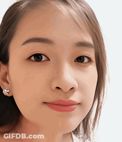 Close Up Of Woman With Earrings GIF