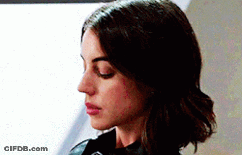 Close Up Of Woman With Eyes Closed And Black Jacket GIF