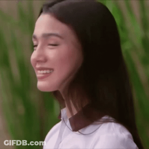 Close Up Of Woman With Eyes Closed Smiling GIF