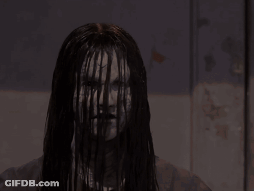 Close Up Of Woman With Long Brown Hair GIF