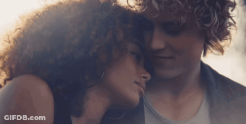 Close Up Of Woman With Man's Head On Shoulder GIF
