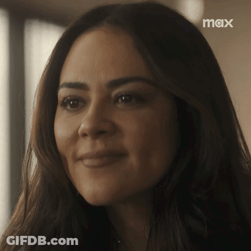 Close Up Of Woman With Max Logo GIF