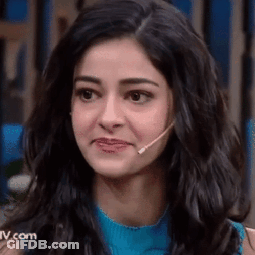 Close Up Of Woman With Microphone And Blue Shirt GIF