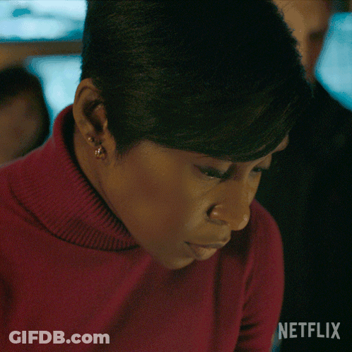 Close Up Of Woman With Netflix Logo GIF