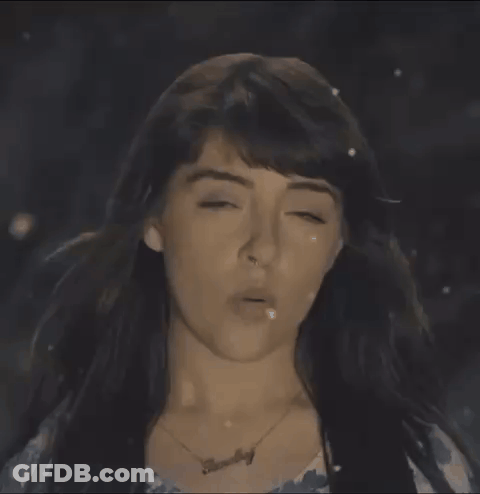 Close Up Of Woman With Nose Ring And Necklace GIF