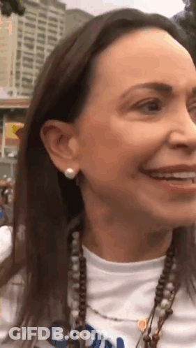 Close Up Of Woman With Pearl Earring GIF