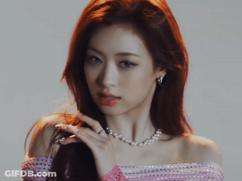Close Up Of Woman With Pearl Necklace And Earrings GIF