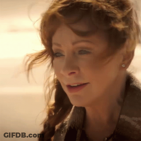 Close Up Of Woman With Red Hair GIF