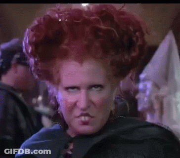 Close Up Of Woman With Red Hair Making Angry Face GIF