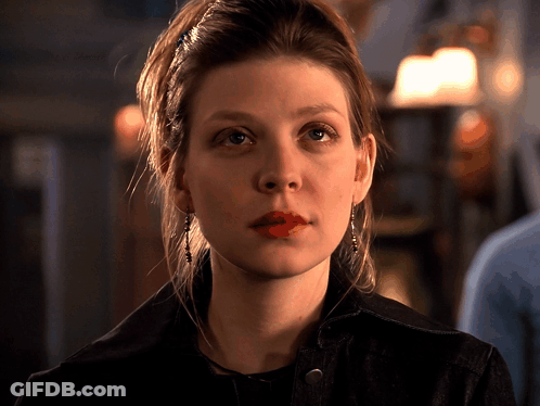 Close Up Of Woman With Red Lipstick And Earrings GIF