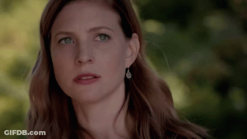 Close Up Of Woman With Serious Look GIF